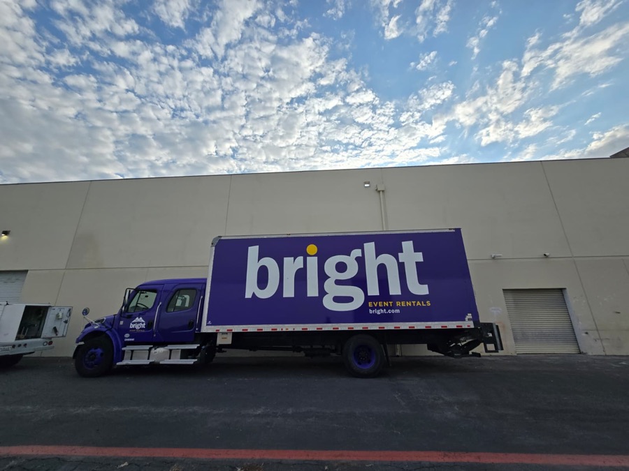 Finished purple box truck with the full bright event rentals lettering