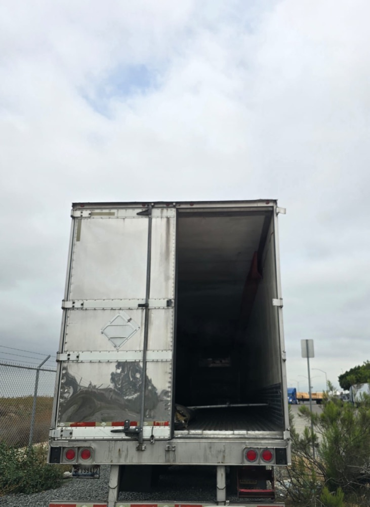 Trailer rear opening with the damaged door taken off