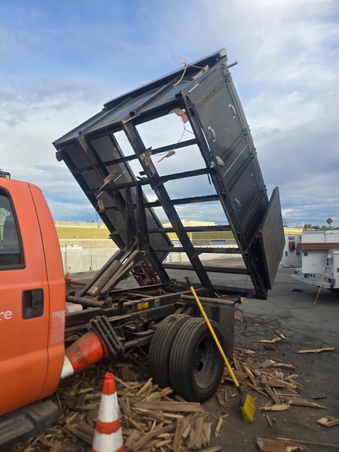 Dump body with the old floor torn out