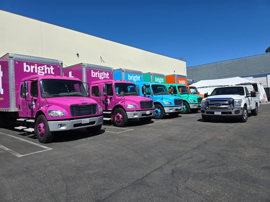 Row of box trucks and a service truck