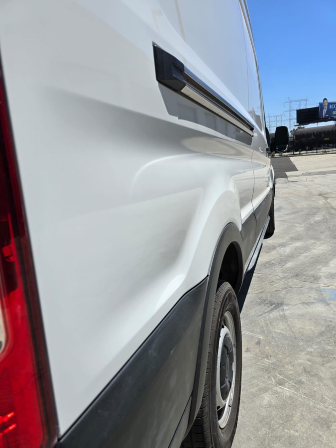 White van side panel after refinishing