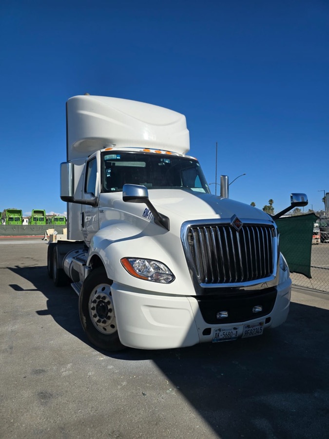 Semi tractor with the bumper and fender repaired