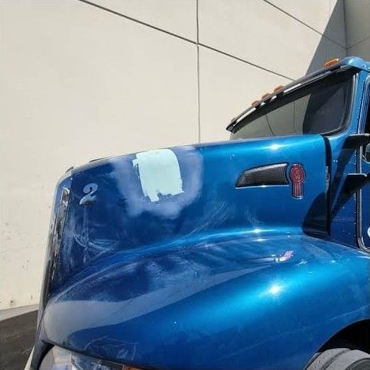 Kenworth hood with the repair patch prepped for paint
