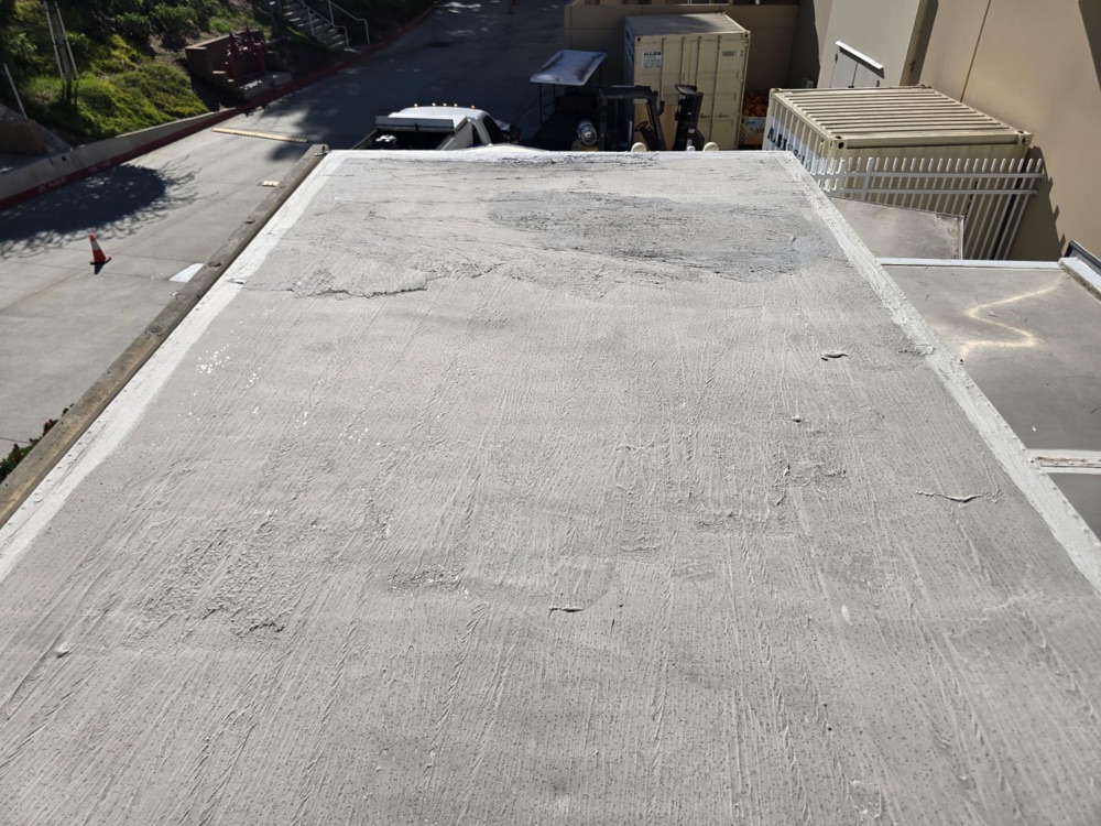 Worn, weathered box truck roof before coating